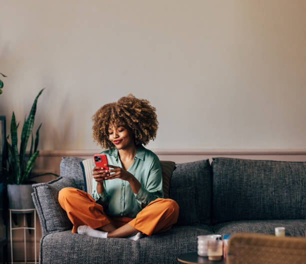 Verified buyer relaxing at home on her sofa